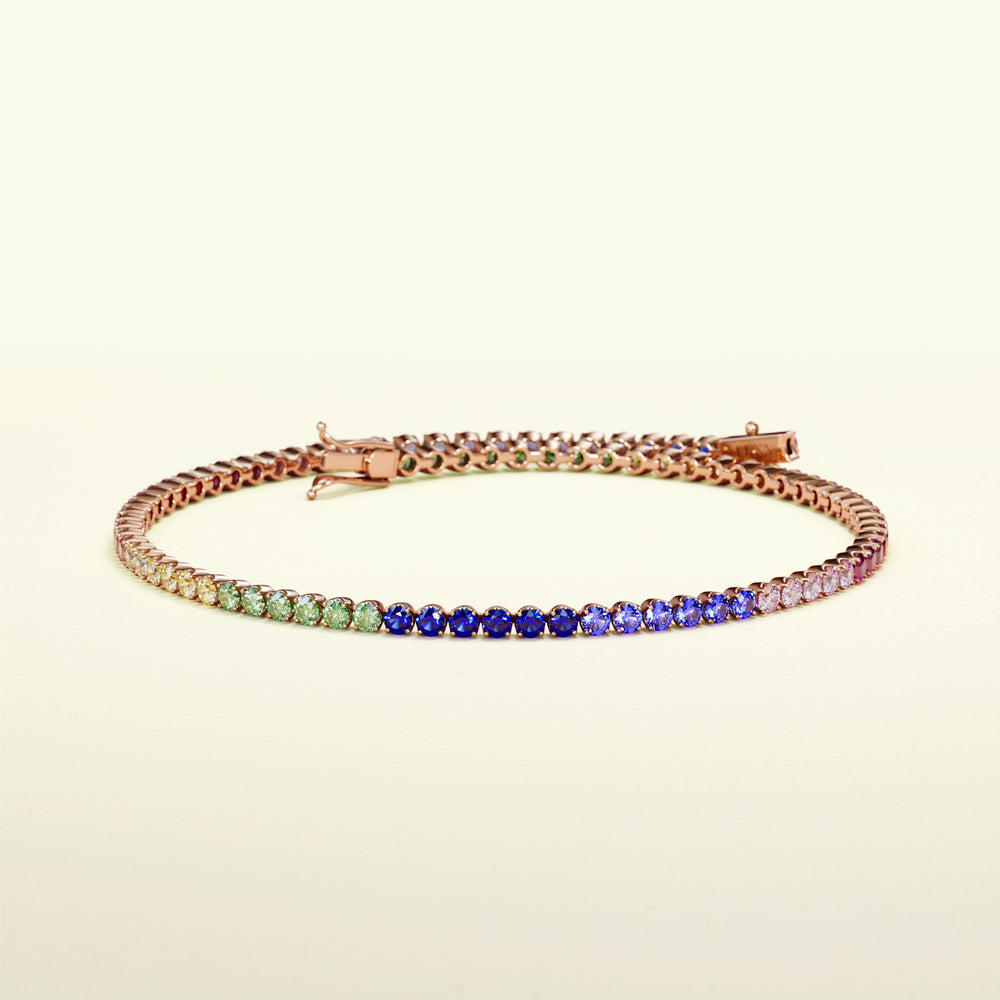 Klassisches Tennisarmband aus Roségold mit Regenbogen Saphiren. Von FENA daily Jewellery.