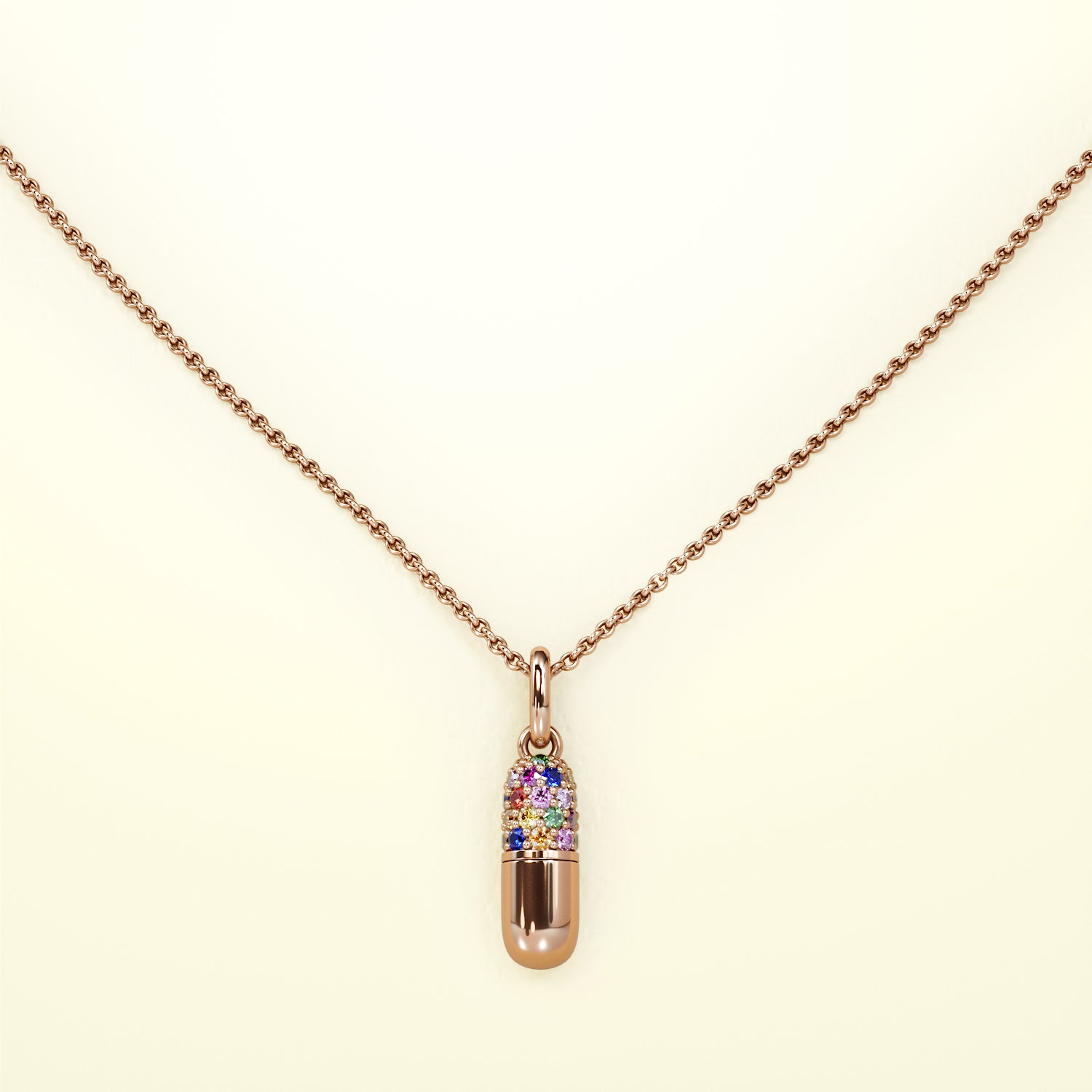 Eine Halskette in Form einer Kapsel, aus fairem Roségold mit Regenbogen Saphiren. Von FENA daily Jewellery